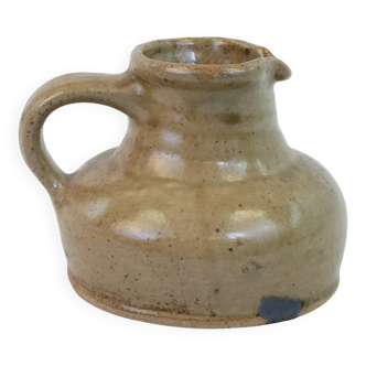 Flat jug in heavy beige stoneware