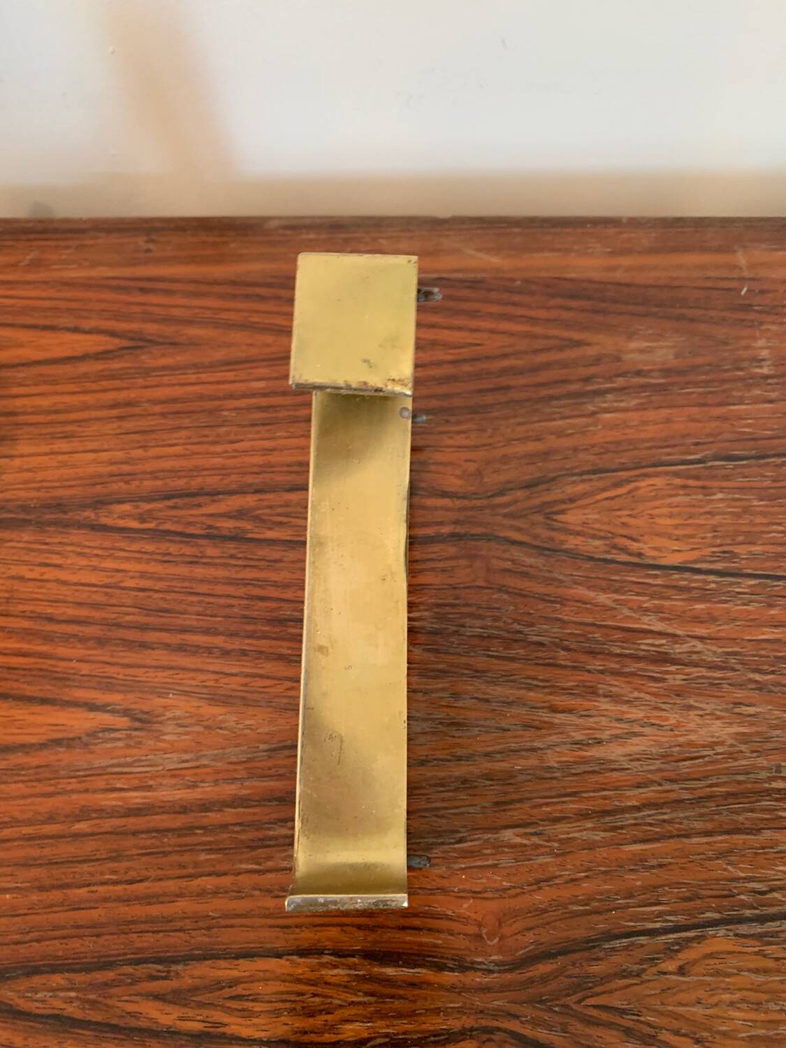 Golden sign letter “T”