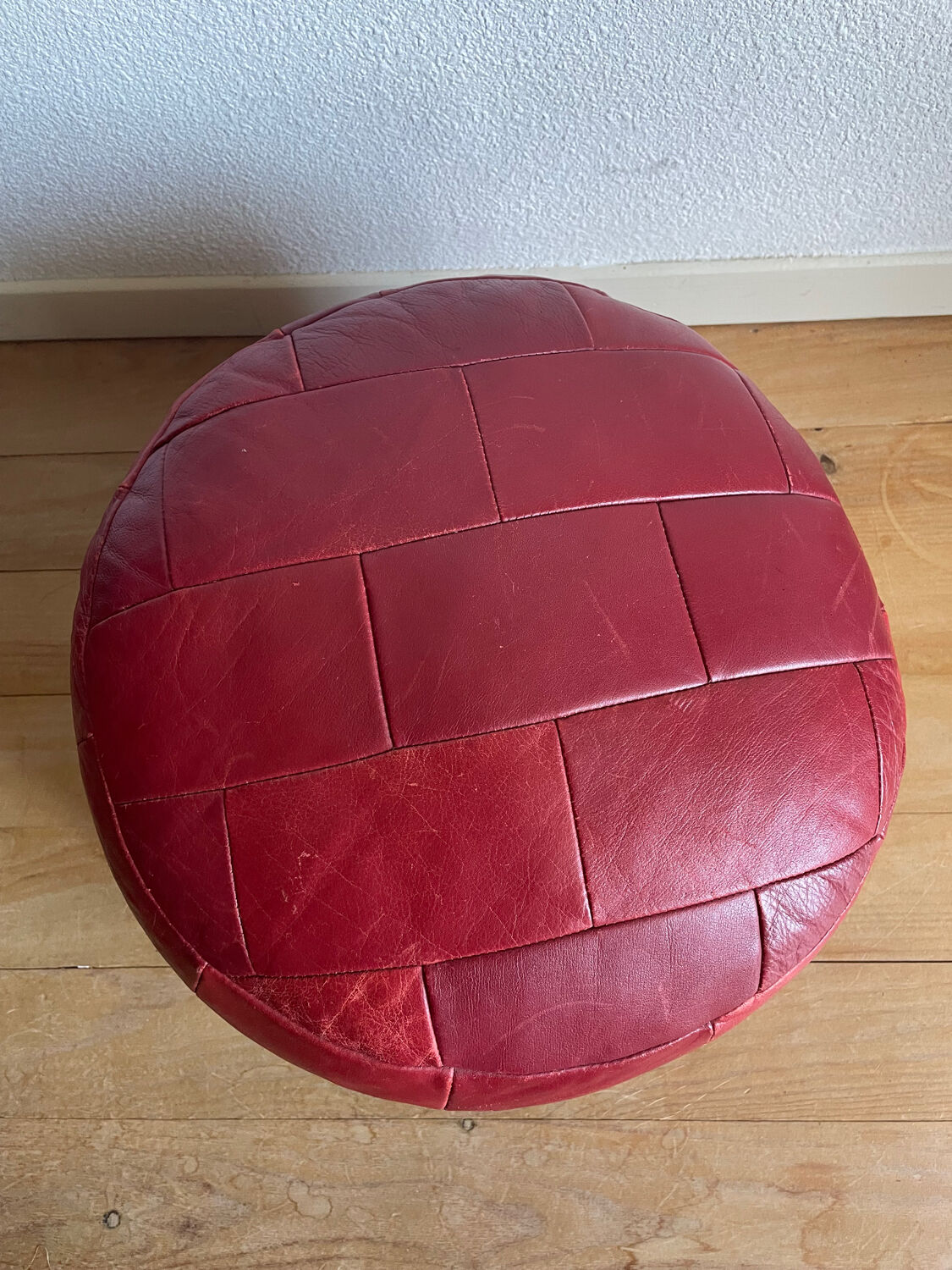 Red patchwork leather pouf