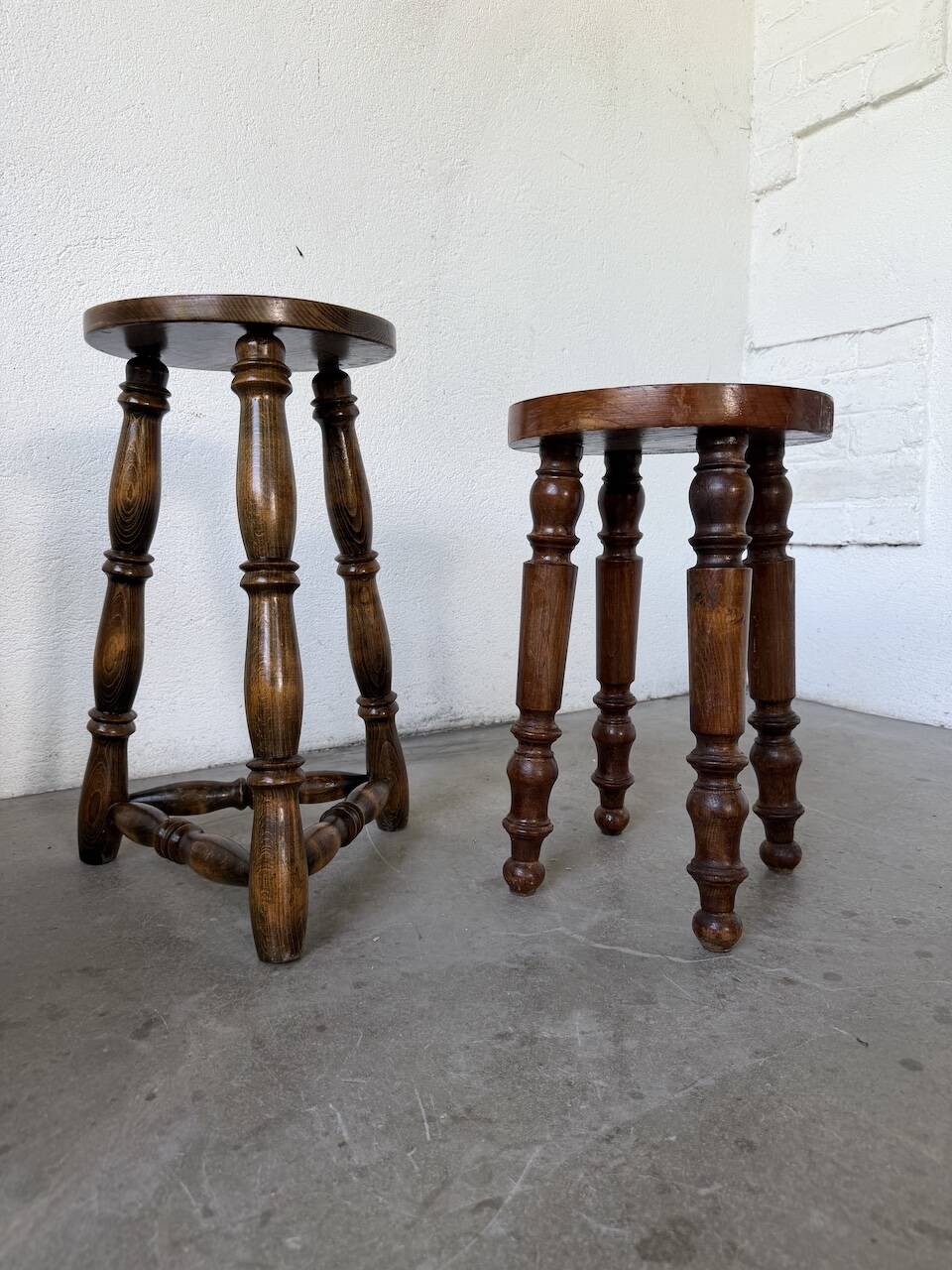 Pair of antique stools with turned legs.