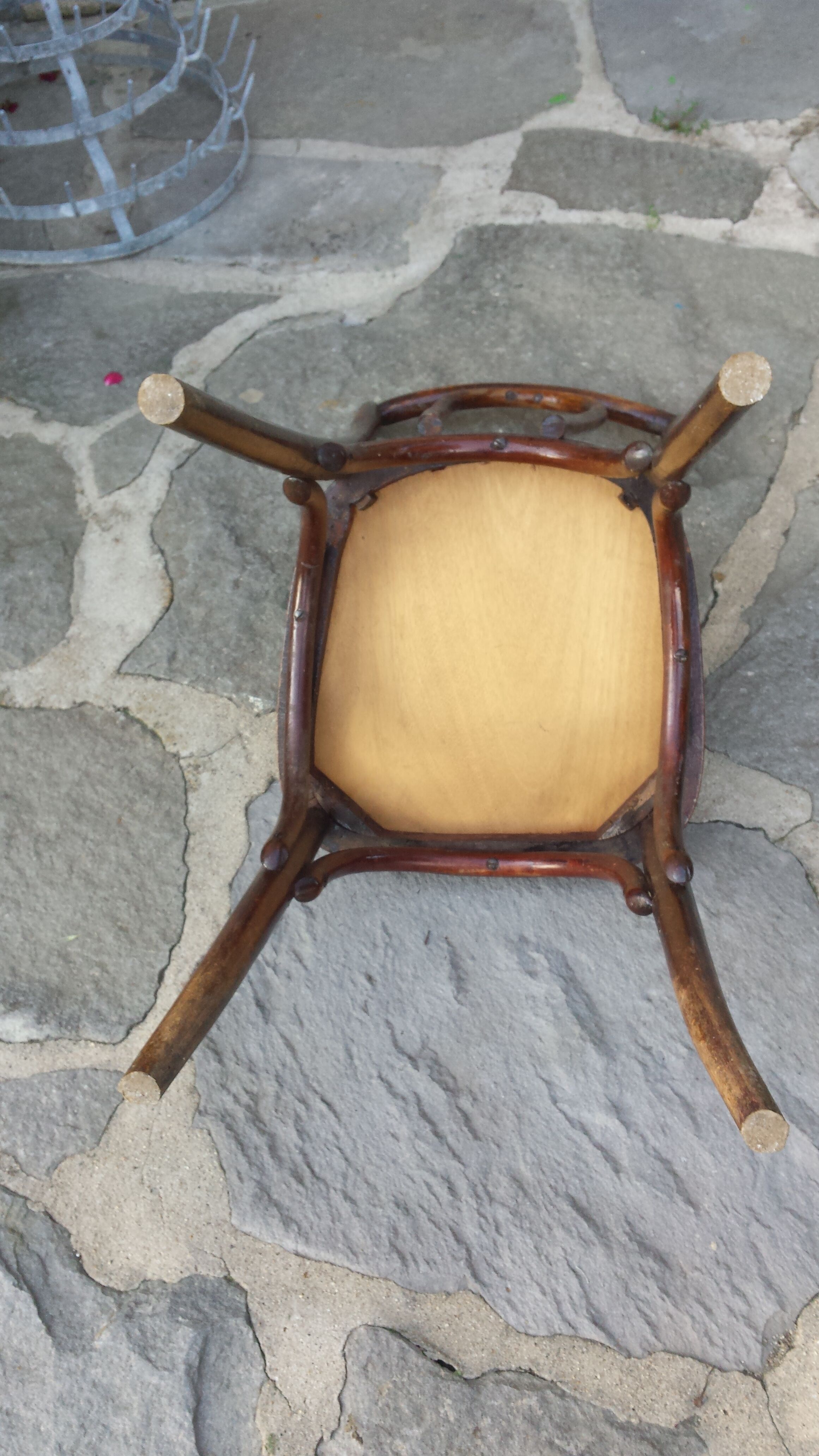 Bistro chair with buchon brand plate