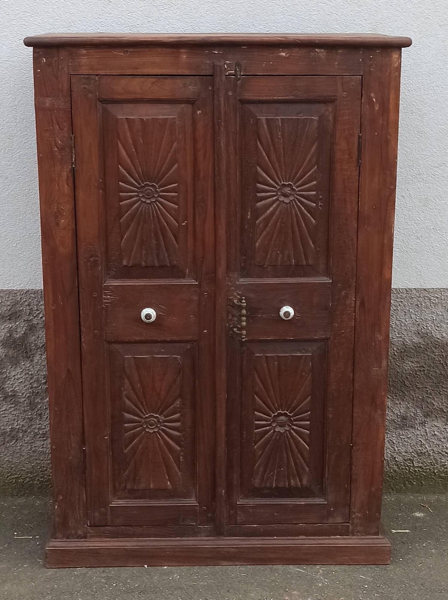Old wooden cabinet with ceramic handles