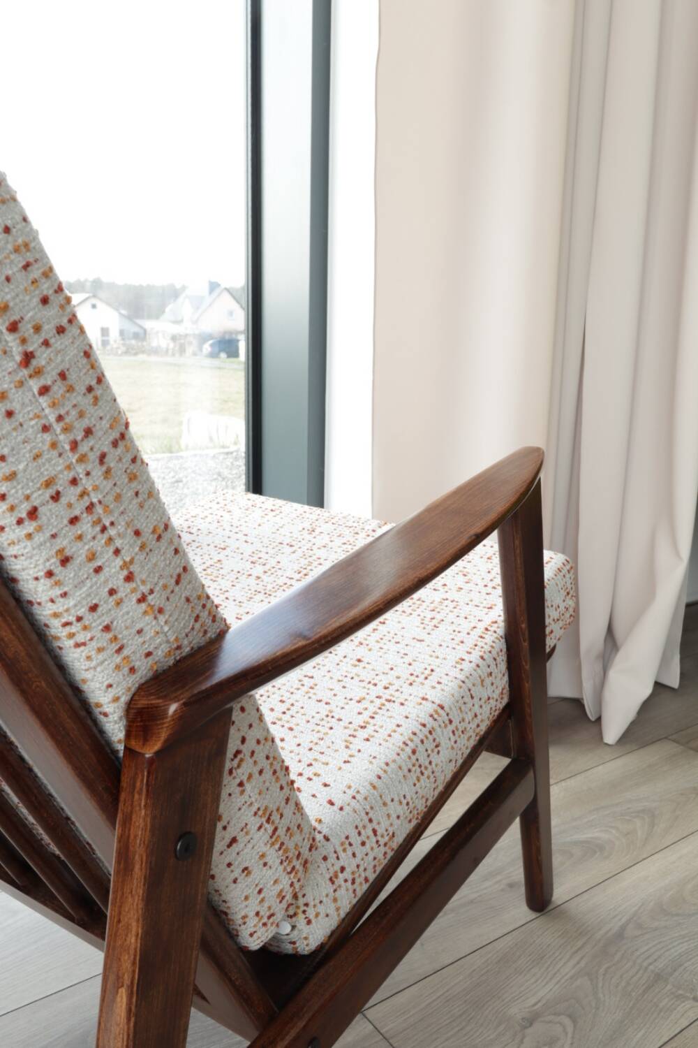 Vintage Danish boucle armchair with orange polka dots from the 1960s.