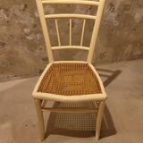 2 white wooden chairs