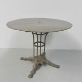 Steel garden table on cast iron base