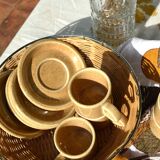 Series of 6 sandstone cups and saucers