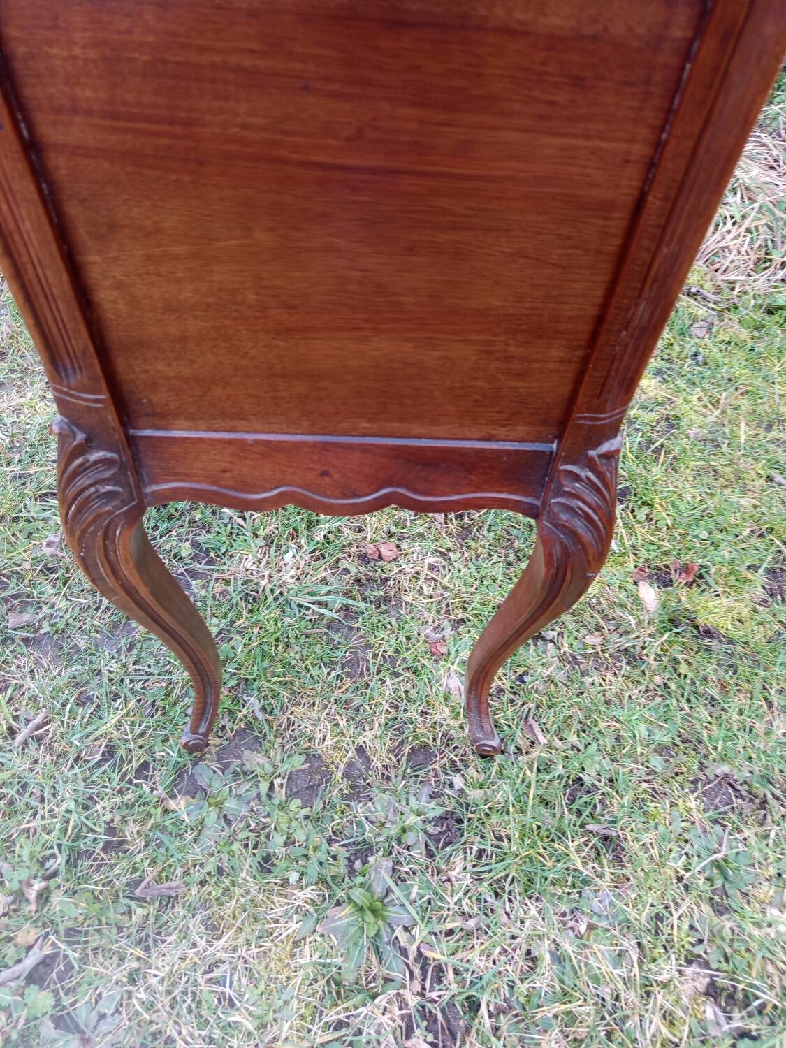 Wood and marble bedside table