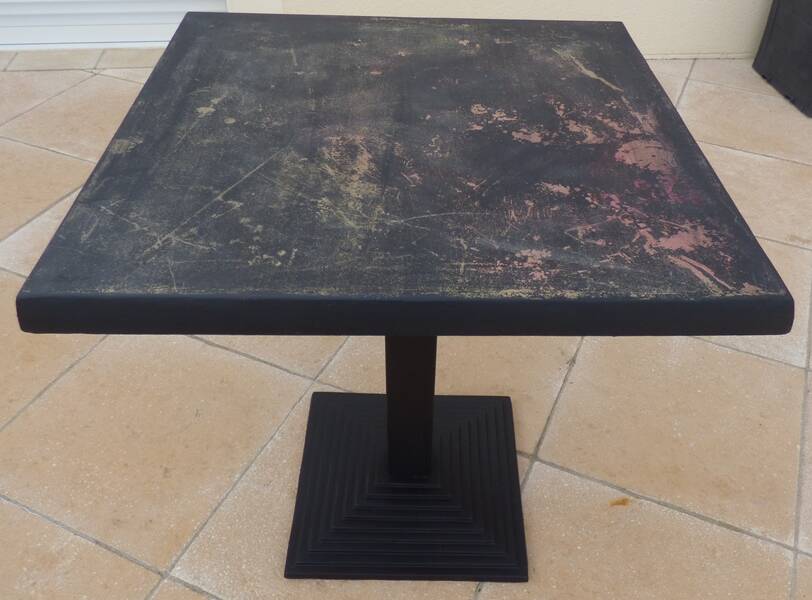 Vintage professional bistro table and its cast iron base