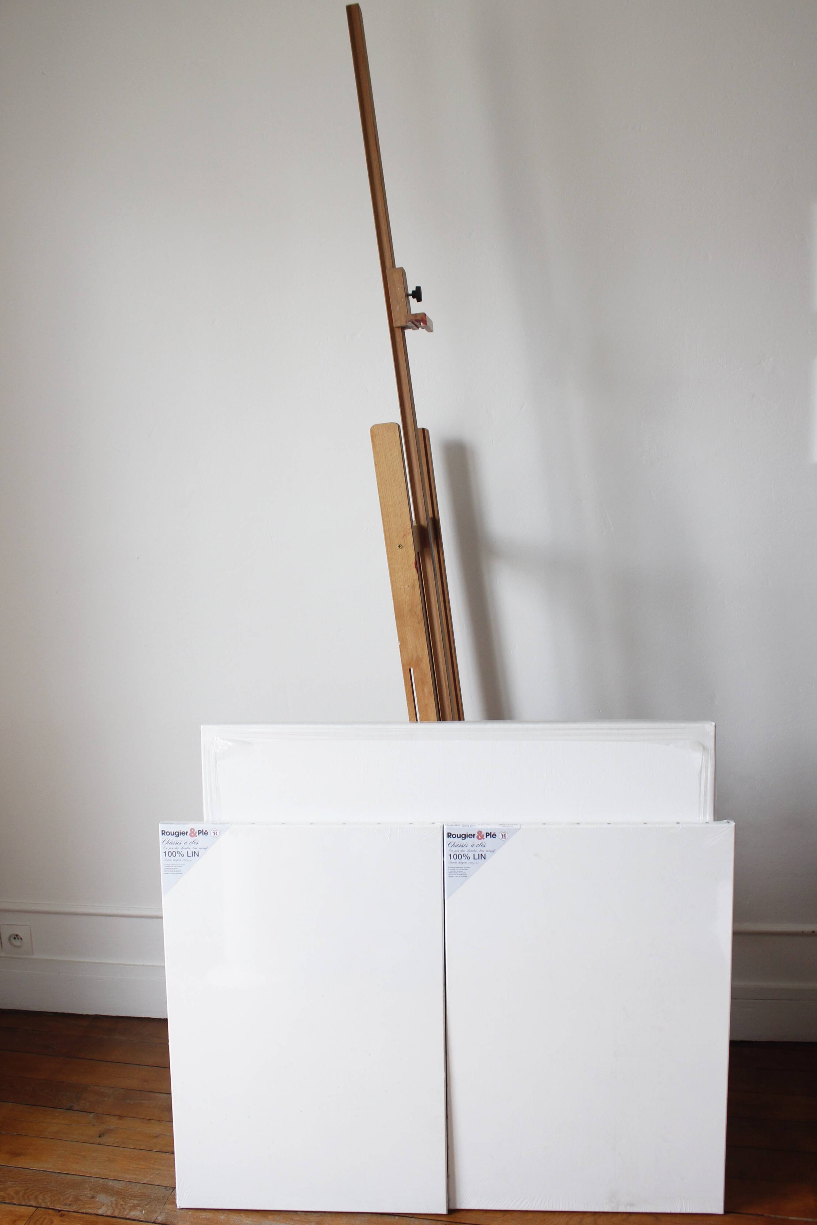 Easel and blank canvases x3