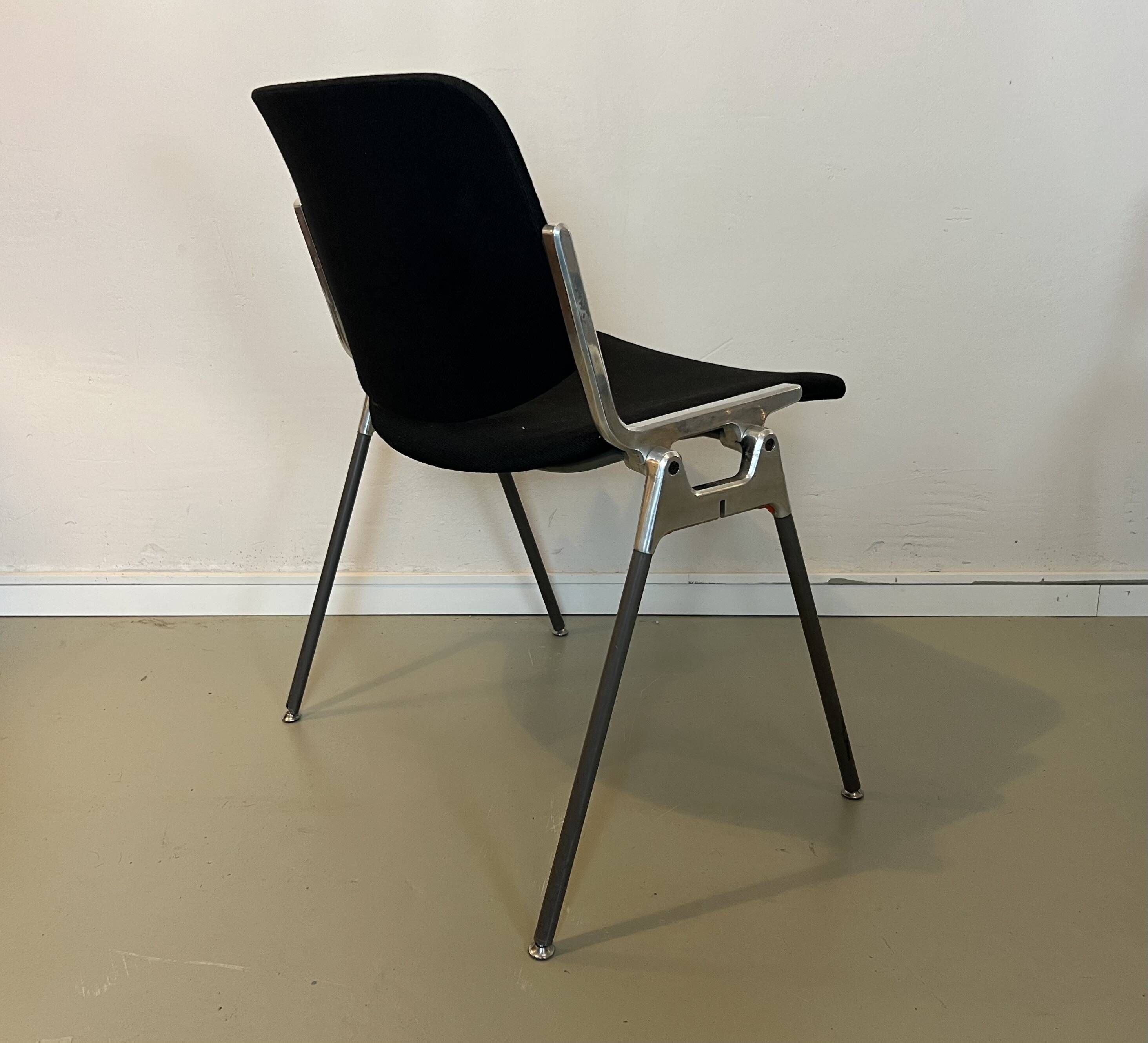 Black DSC chairs by Giancarlo Piretti for Castelli from the 60s/70s.