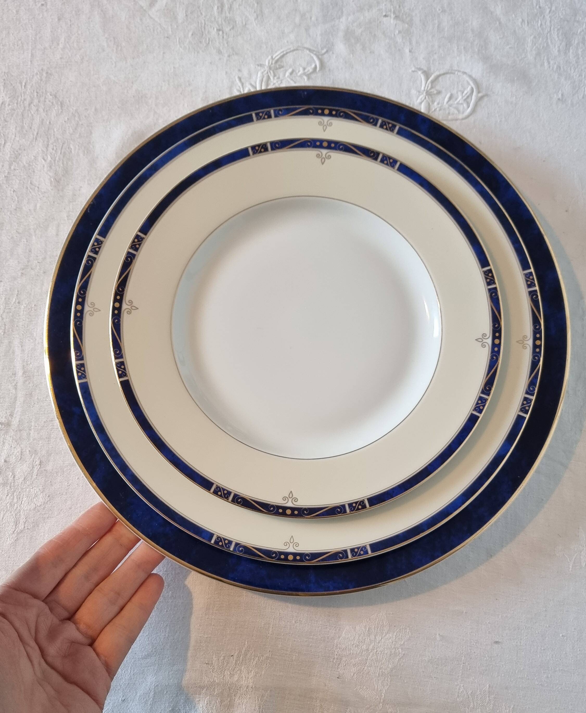 18-piece porcelain dinnerware set from Limoges by Philippe Deshoulières.