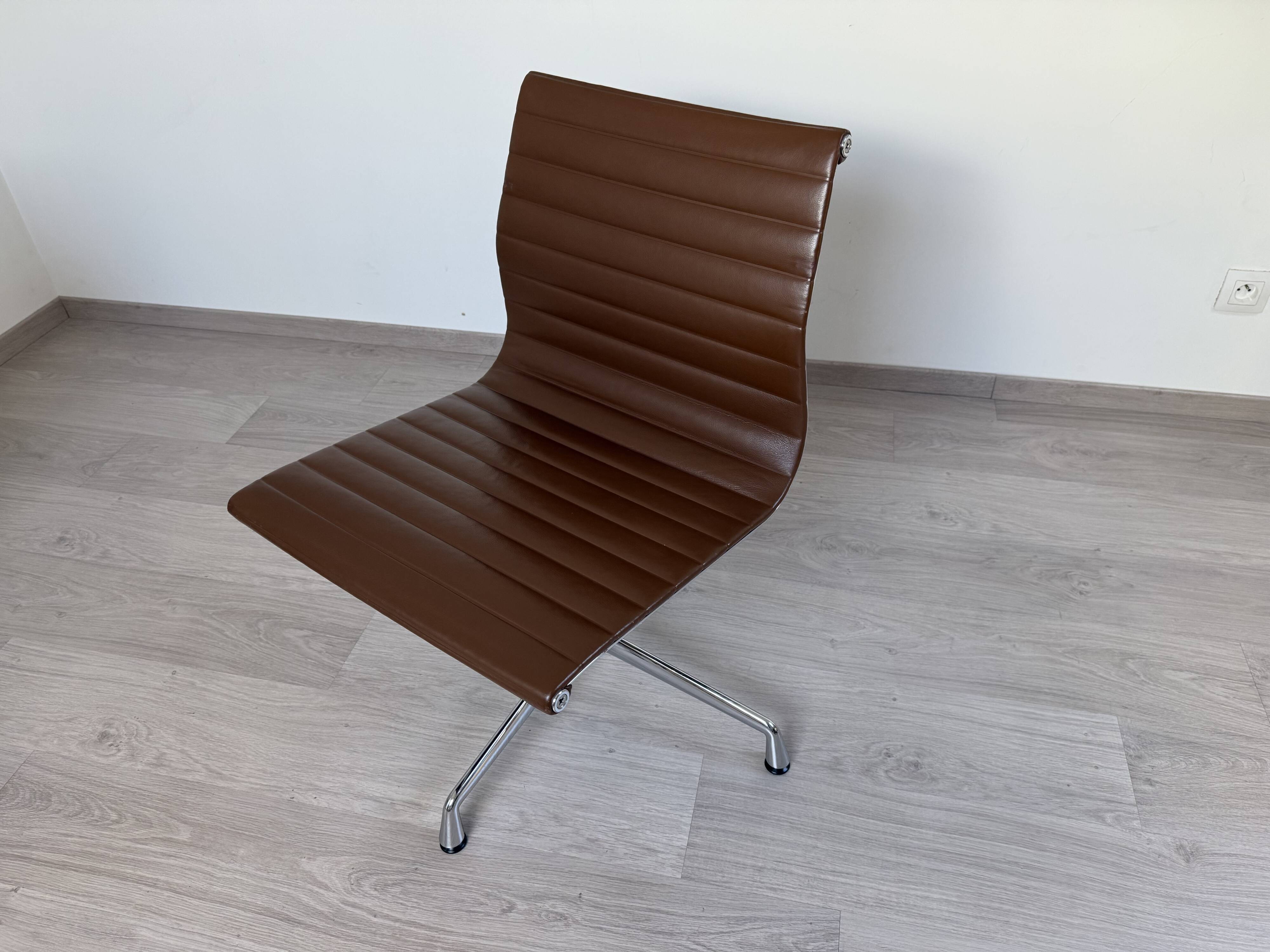 Set of 4 Eames EA105 Vitra armchairs from 2007