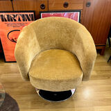 Swivel velvet armchair