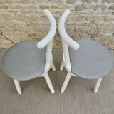 Pair of wooden and Skaï chairs from the 80s, Italy