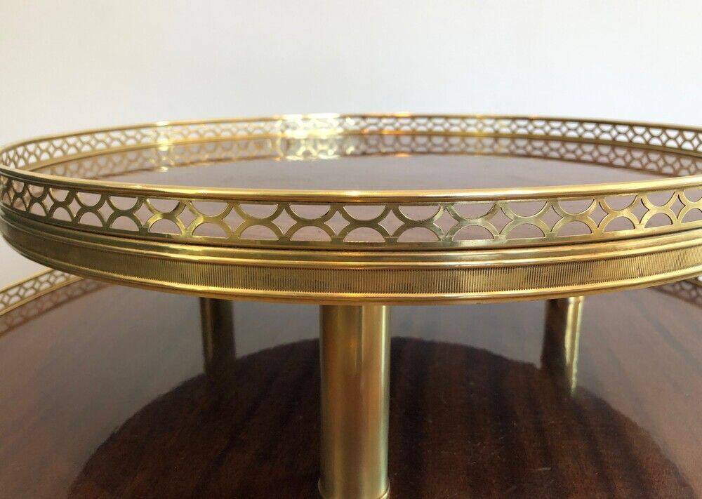 Tripod gueridon in neoclassical style made of mahogany, brass, and a golden metal base.