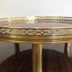 Tripod gueridon in neoclassical style made of mahogany, brass, and a golden metal base.