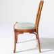 Pair of rattan and blue floral fabric chairs
