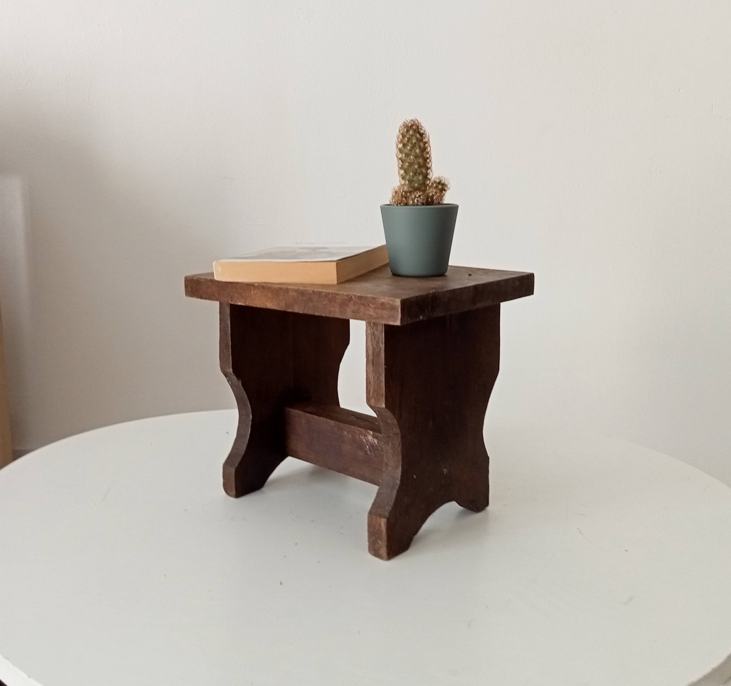 Ancient primitive milking stool