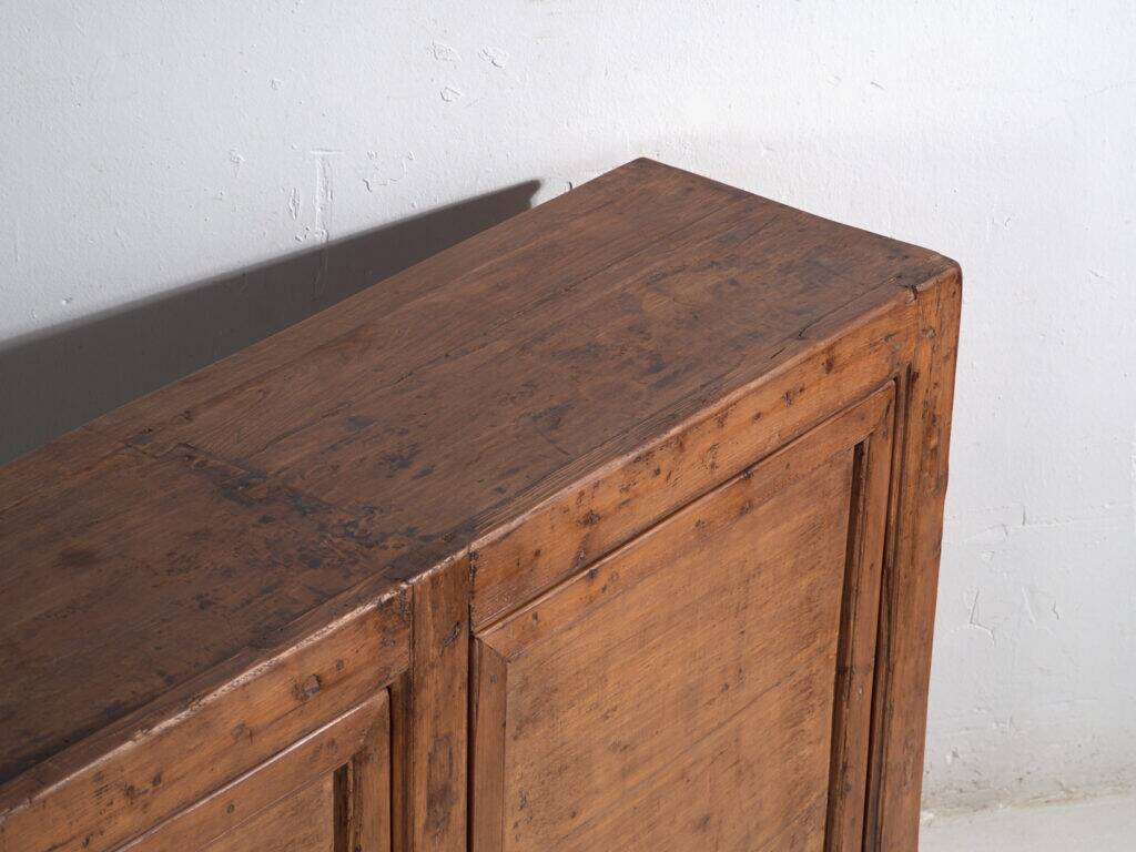 Chinese buffet high in carved pine with geometric panels – Gansu, circa 1930
