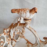 Bougeoir mural en fonte ancienne décor oiseau et volutes