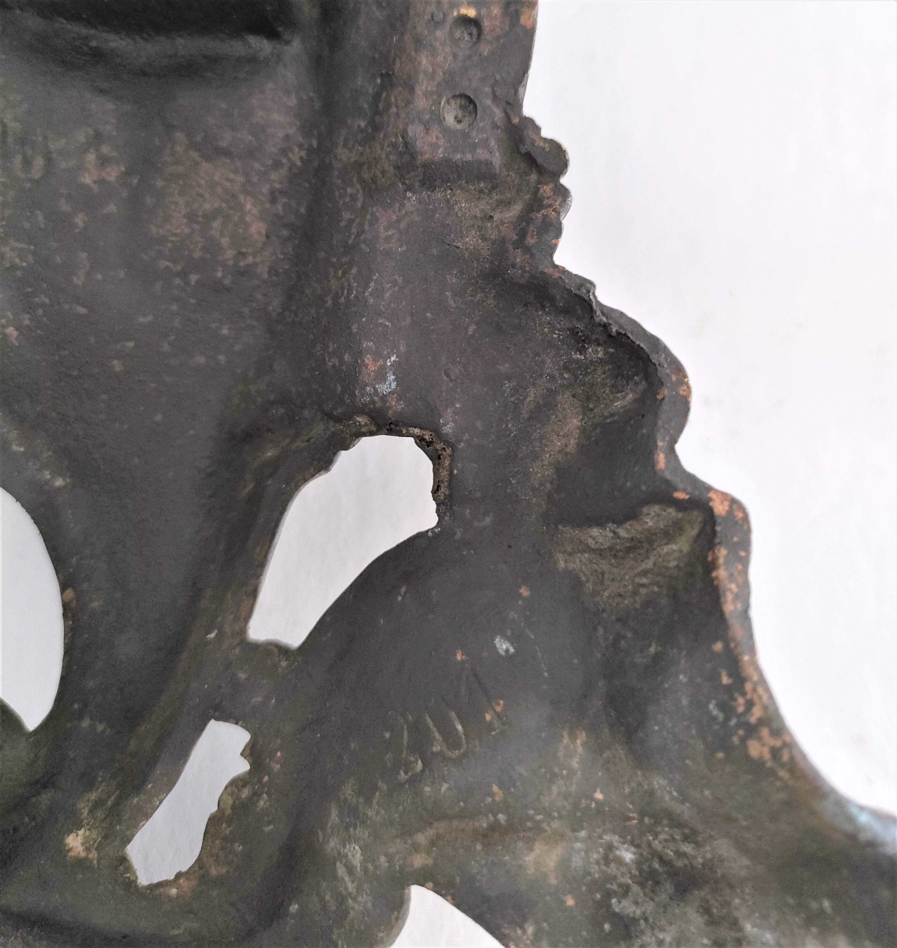 Pair of bronze andirons with black patina, 19th century, female caryatids