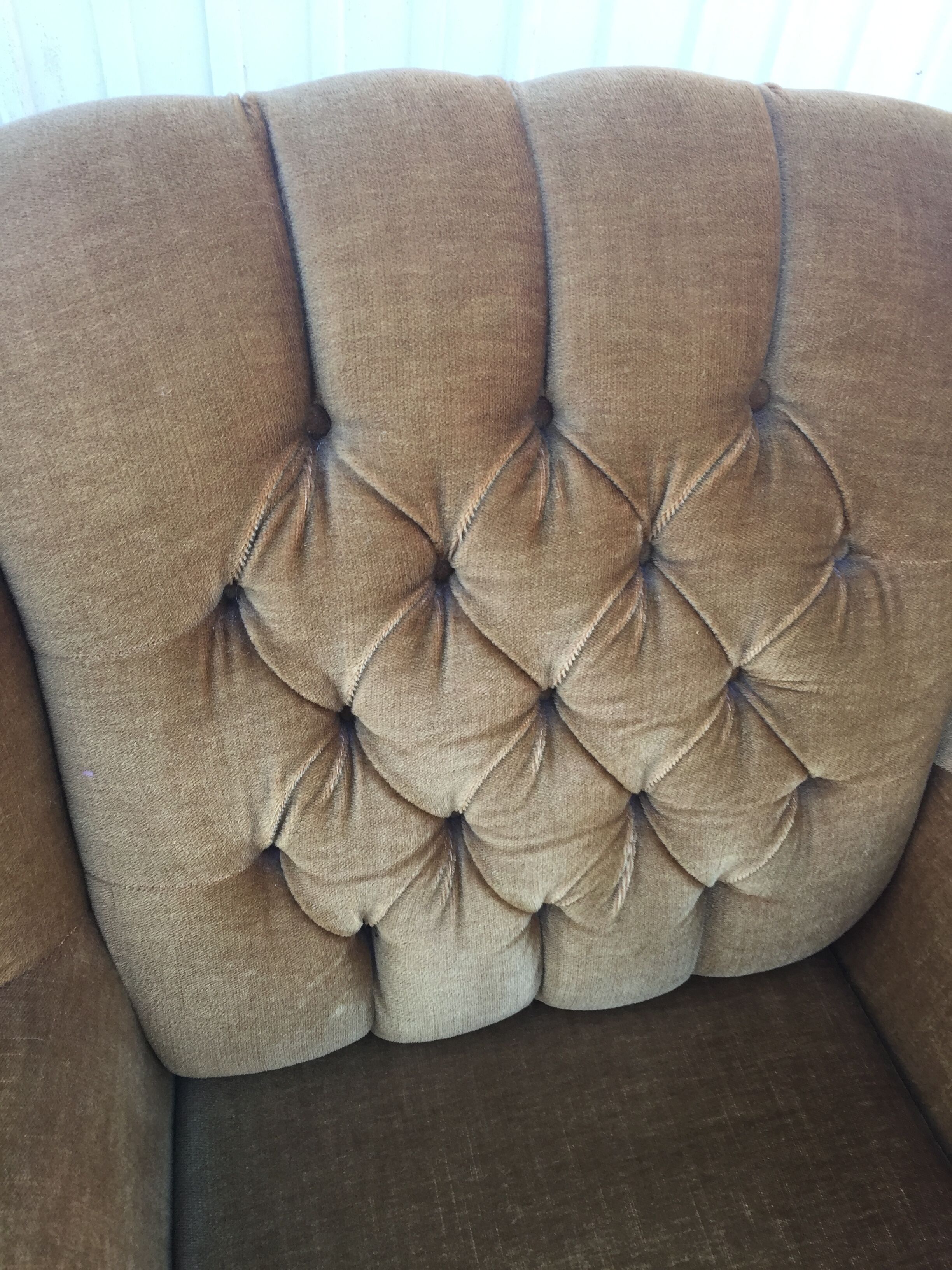 Pair of upholstered velvet armchairs