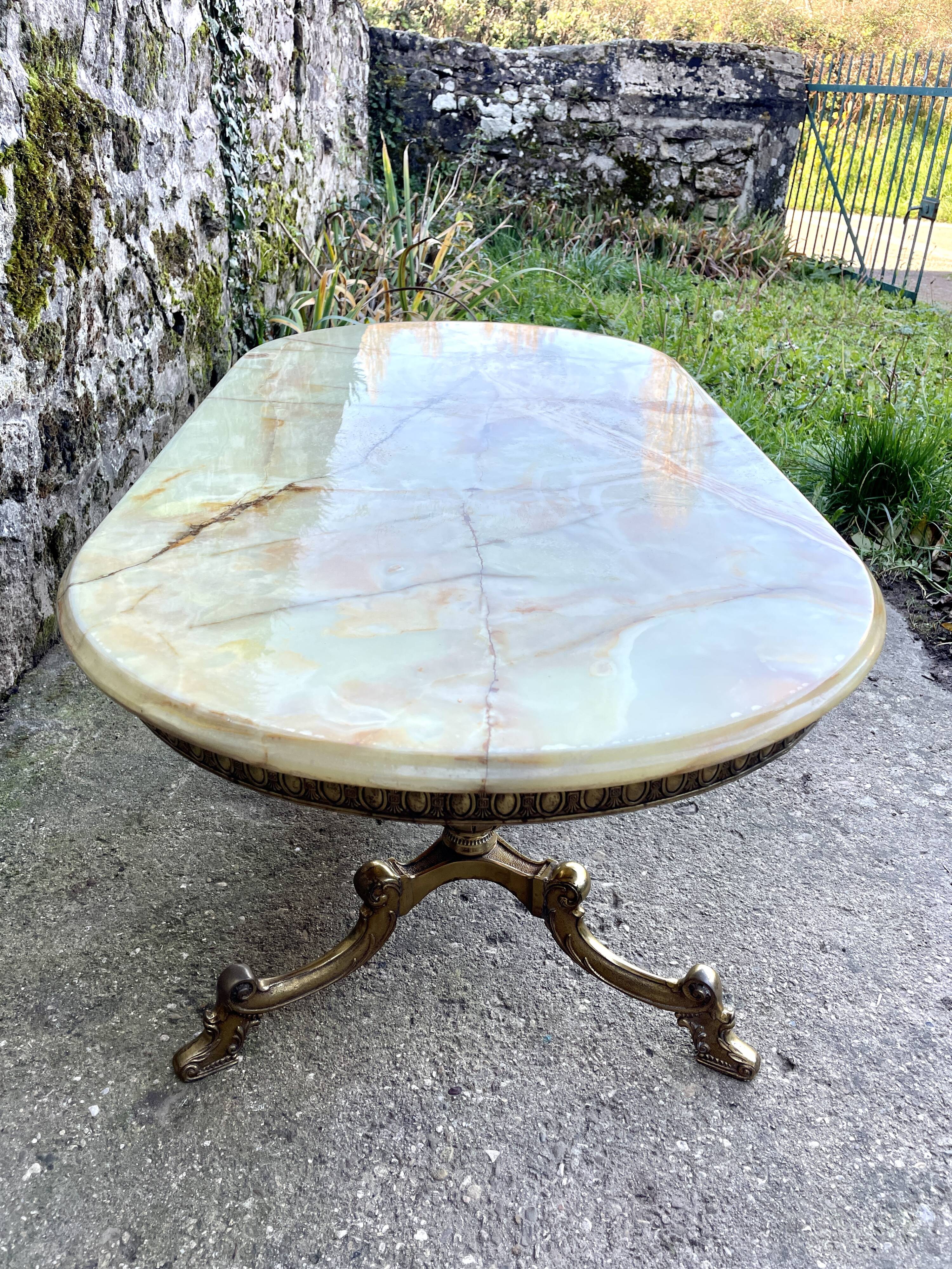 Louis XVI style oval coffee table in onyx and gilt brass