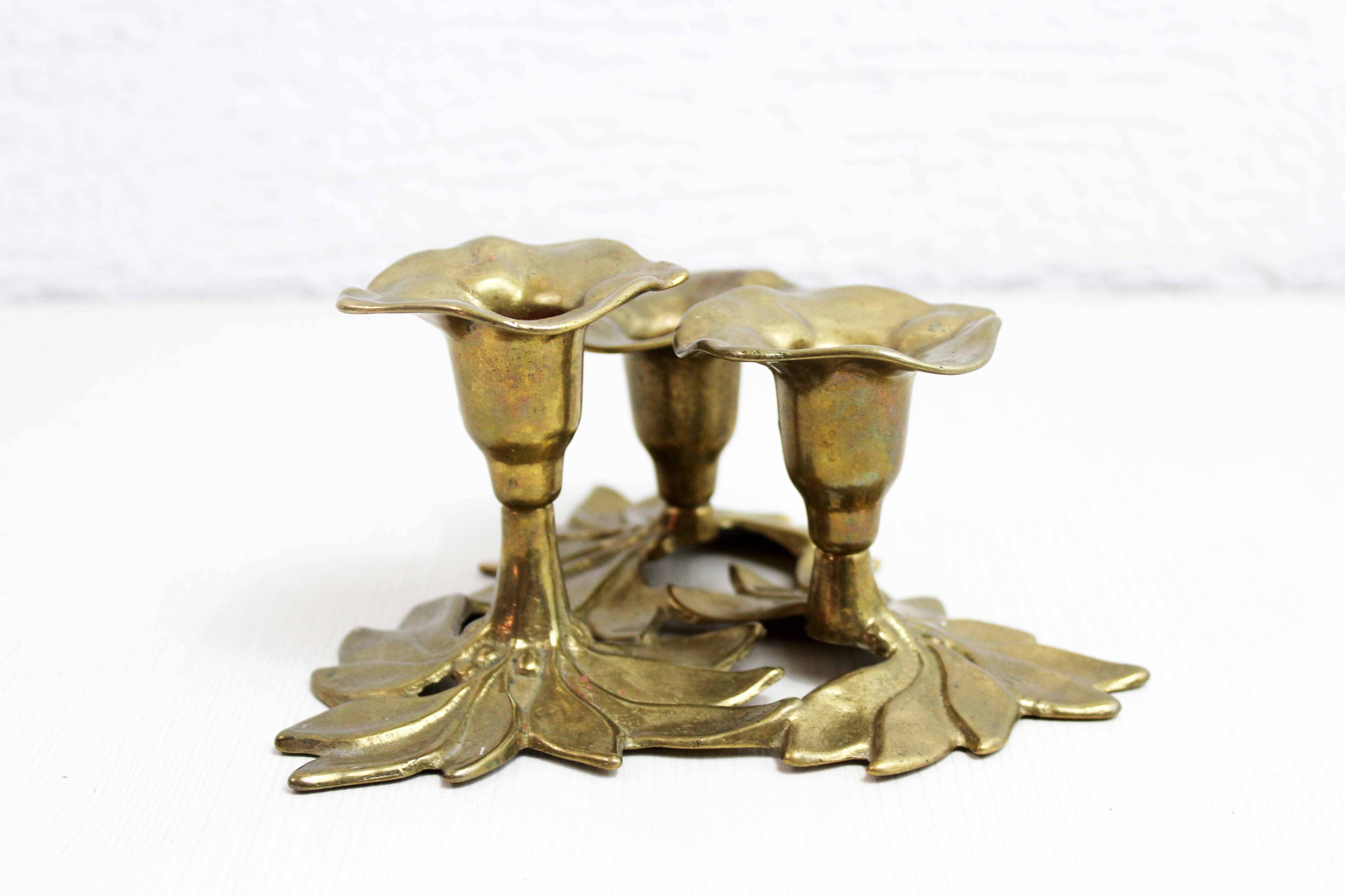 Brass flower candle holder