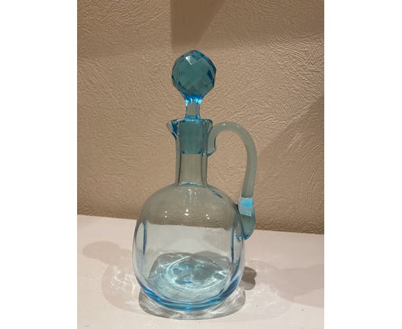 Blue carafe with vintage button