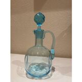 Blue carafe with vintage button