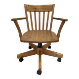 Solid wood swivel and reclining armchair.