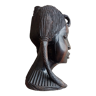 Wooden sculpture portrait of black african woman