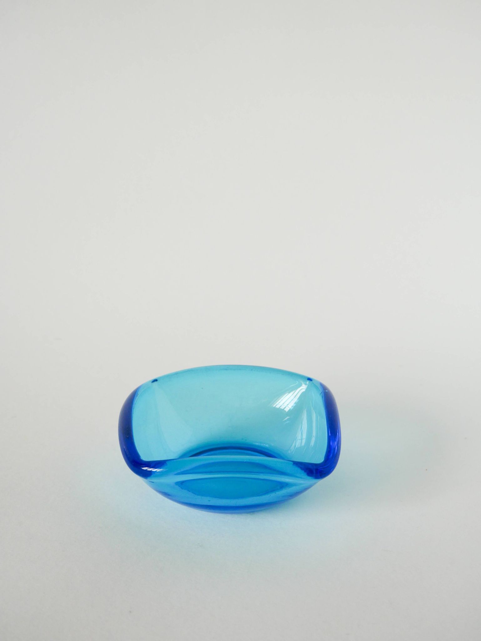 Blue colored glass pocket, in the style of Murano, 1970