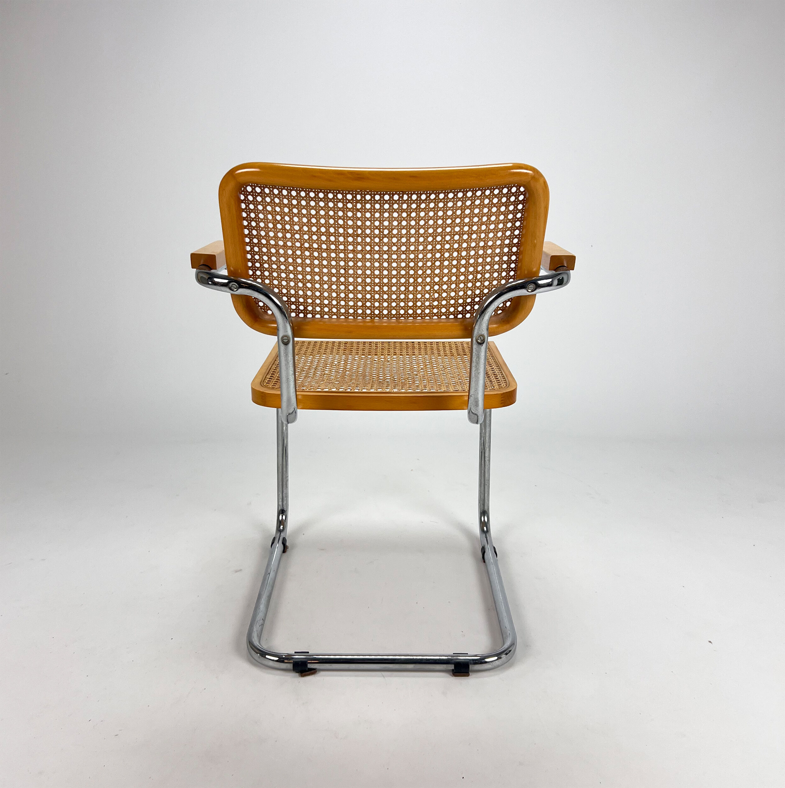Tubular frame and cane cantilever dining chair, italy, 1970s