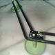 Coat rack with 4 green metal hooks from the 70s