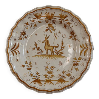 Signed Moustiers plate, in yellow shades