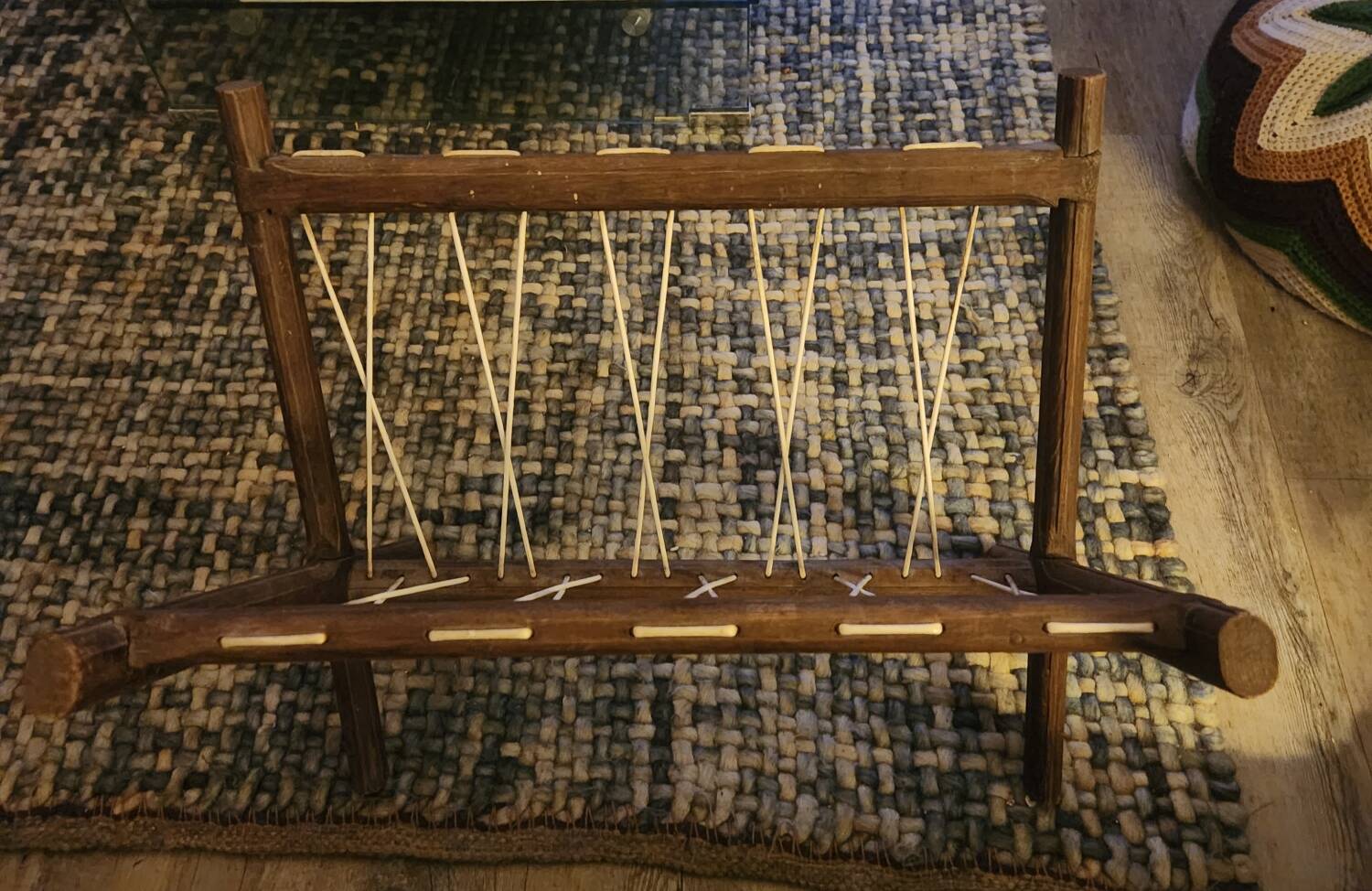 Vintage wooden and wire magazine rack