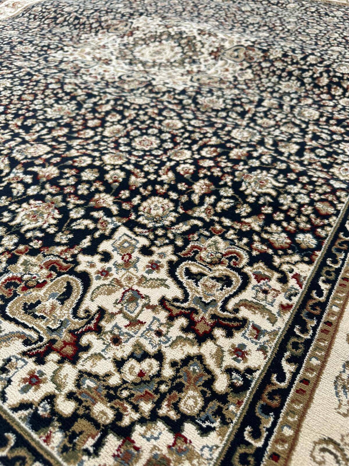 Classic navy blue living room rug decorated with flowers