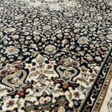 Classic navy blue living room rug decorated with flowers