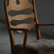 Razorblade armchair from the mid-20th century by Henning Kjærnulf, oak and lambswool, 1960.