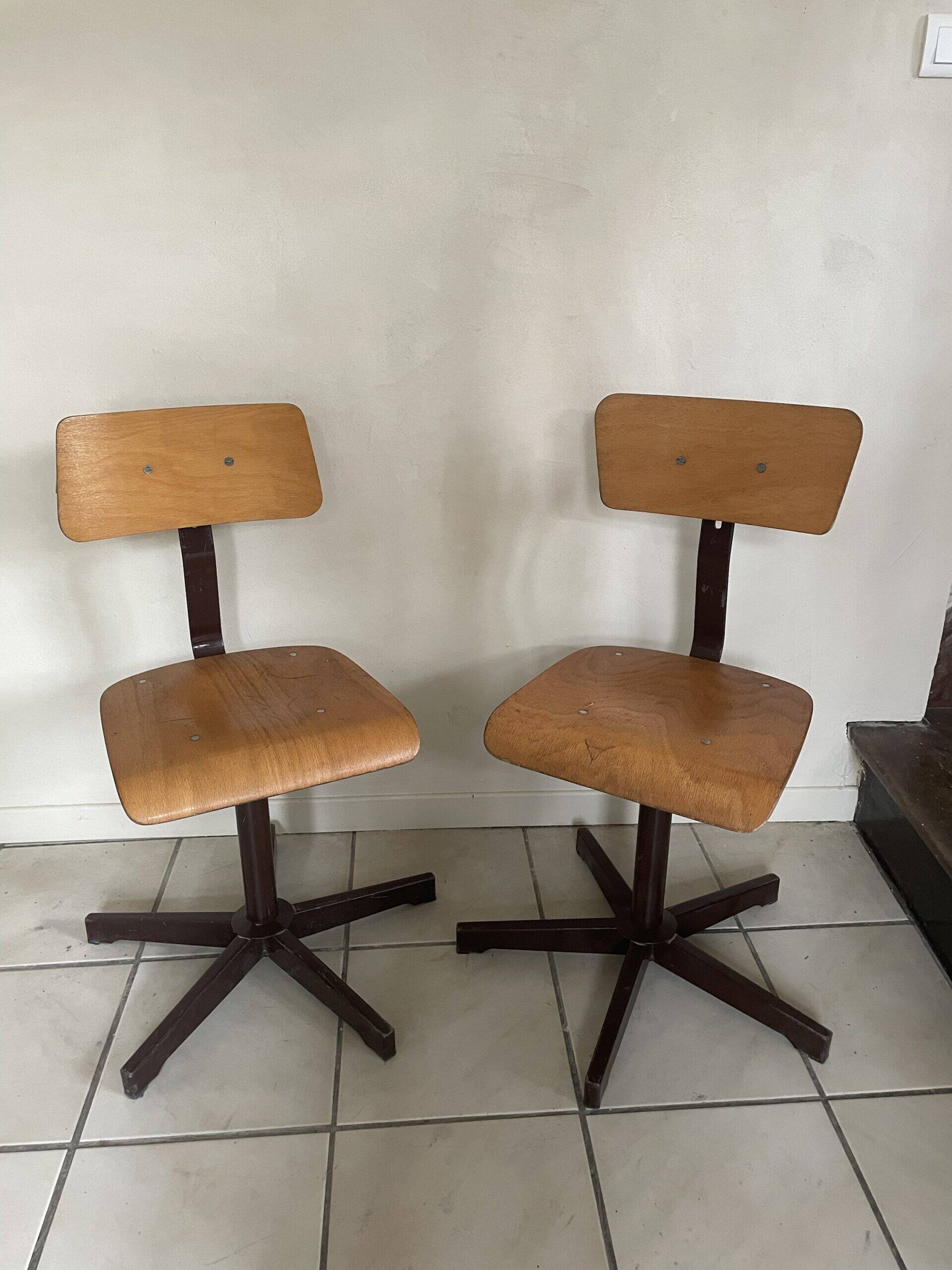 Pair of industrial swivel chairs