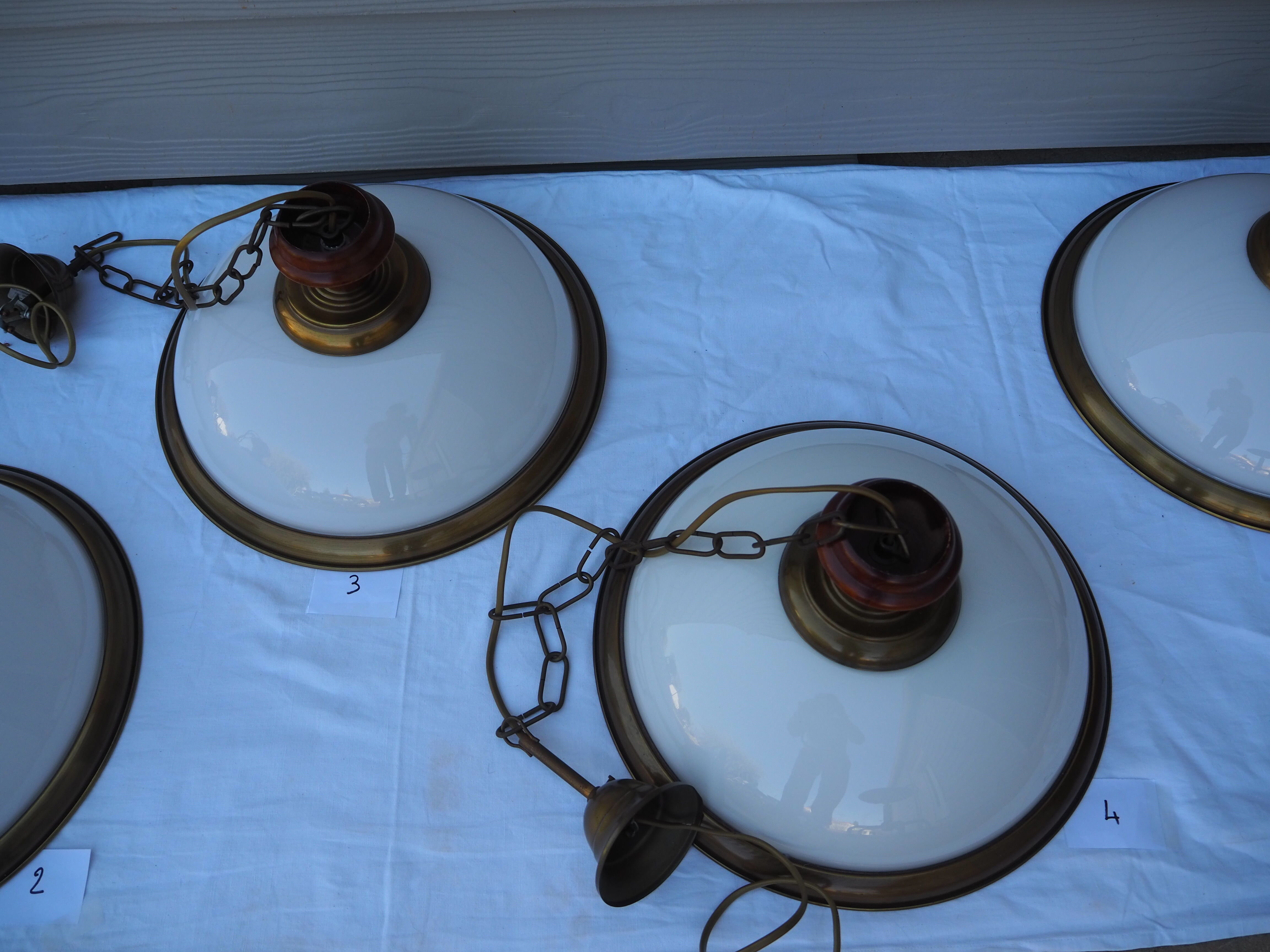 Suspension in white opaline, its edge in aged brass