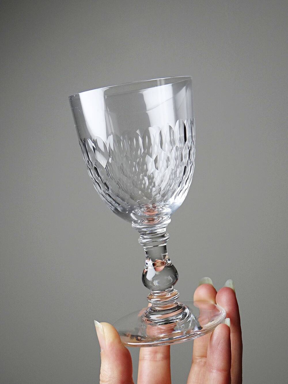 Set of 7 cut crystal port glasses by Baccarat, Richelieu variant.
