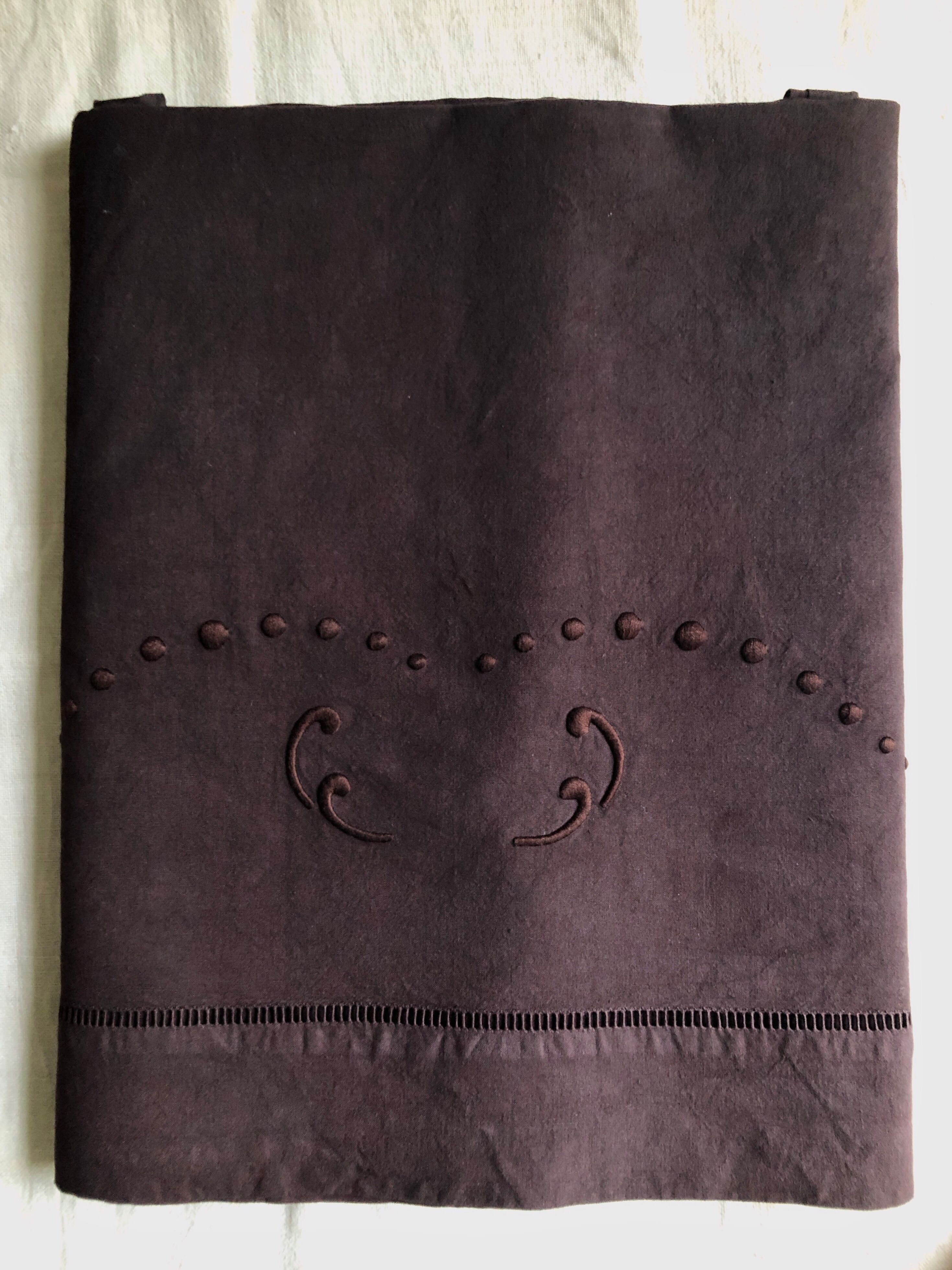 Old linen and cotton sheet tinted eggplant