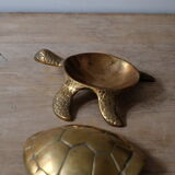Empty brass turtle pocket