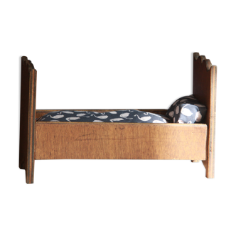 Wooden doll bed