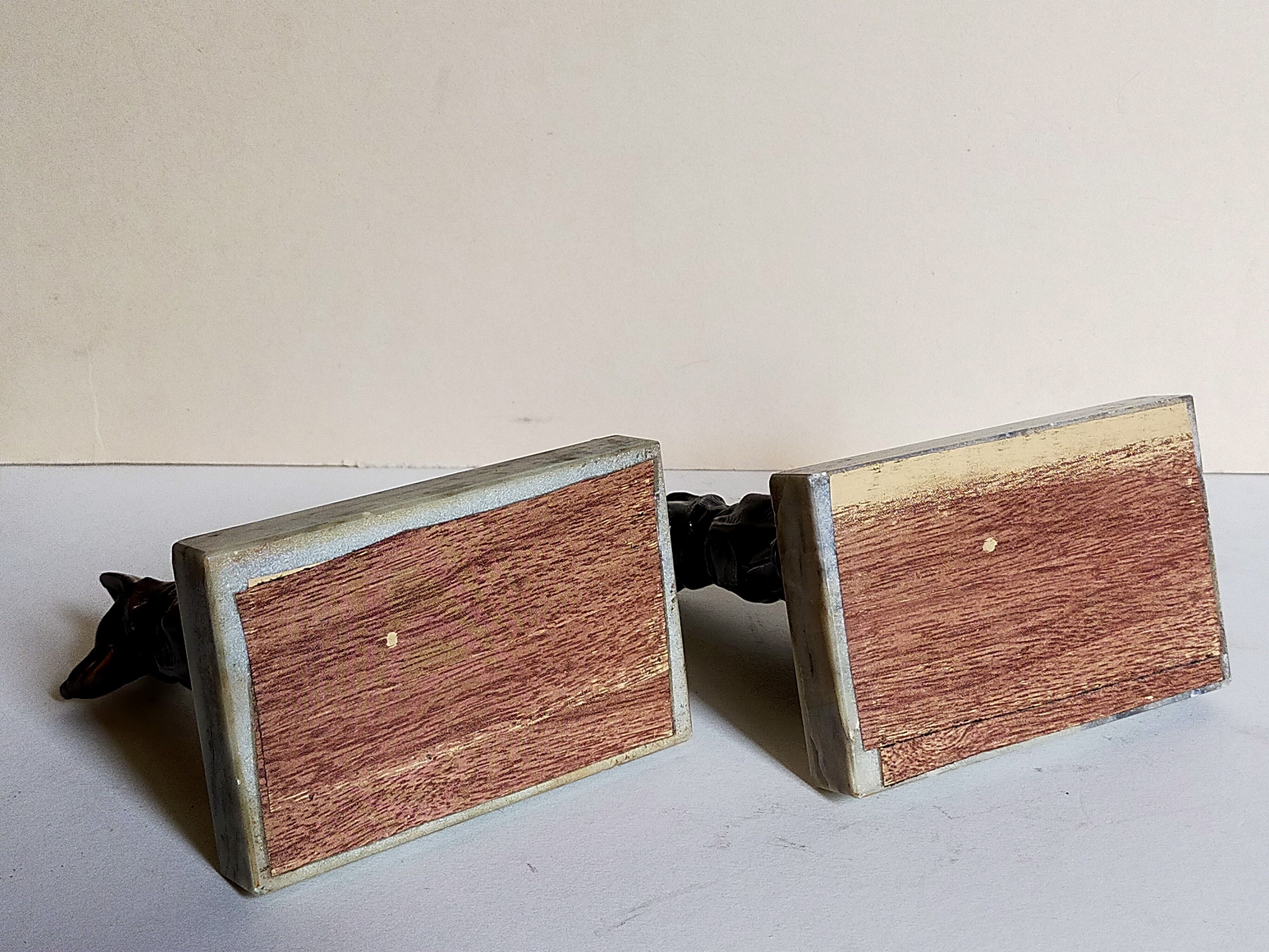 Pair of Art Deco bookends to signed wolf dogs
