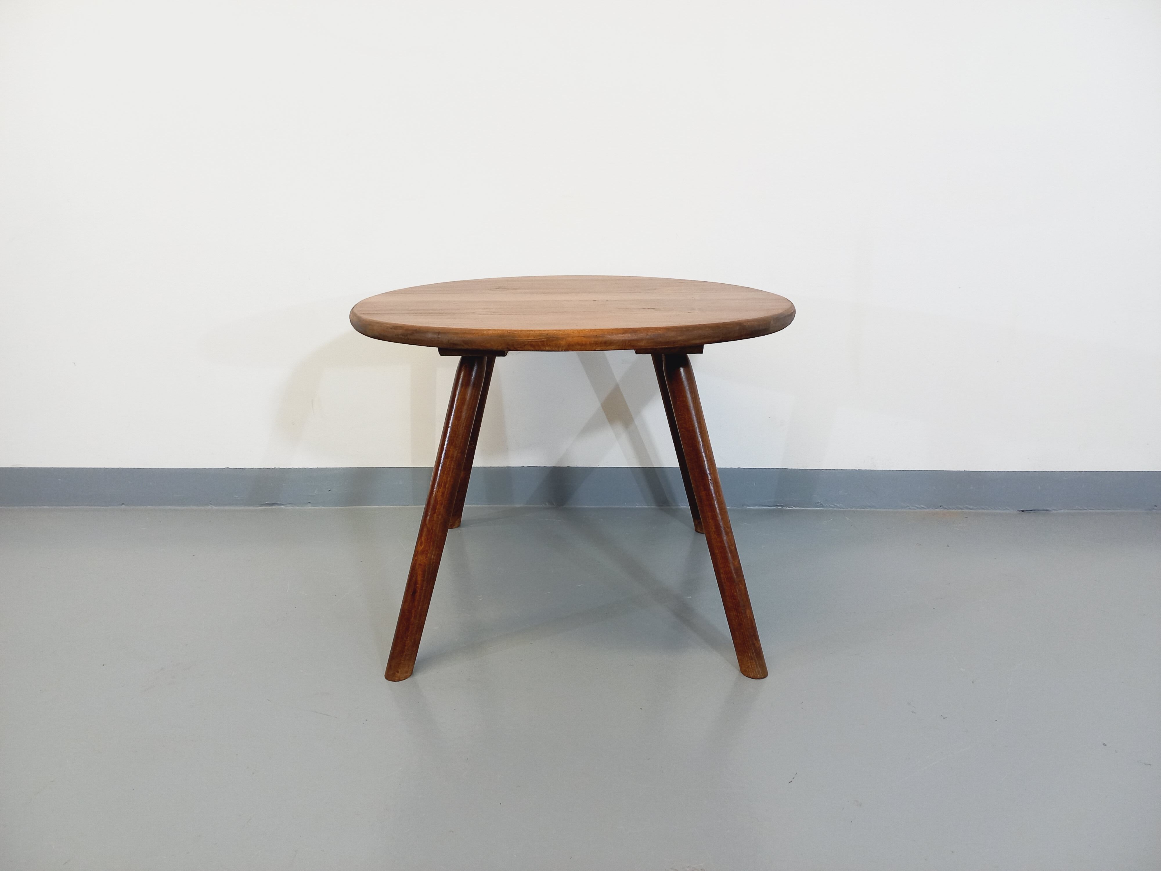 Vintage round brutalist coffee table in solid oak wood from the 50s