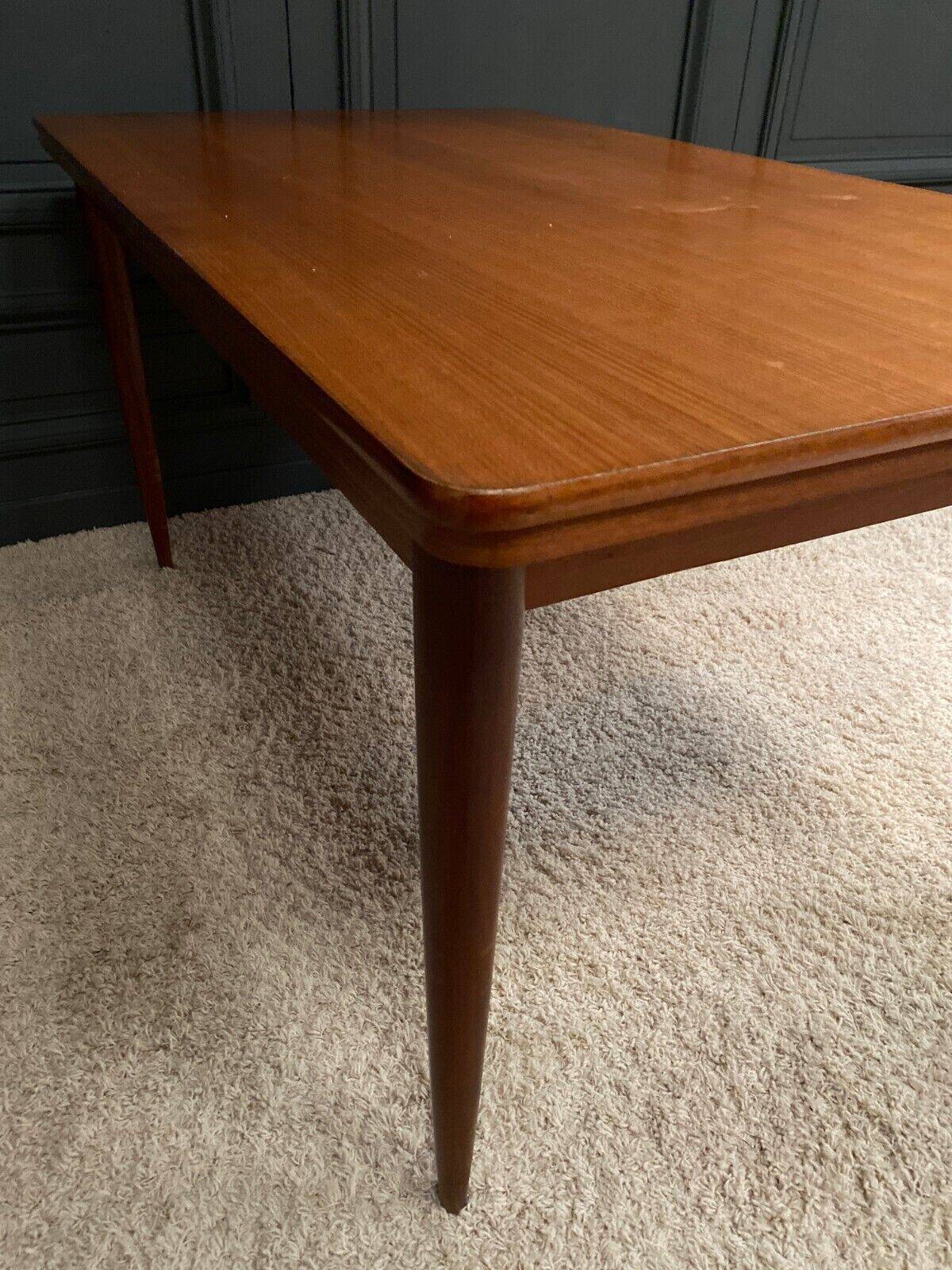 Scandinavian rectangular teak dining table with 4 tapered legs