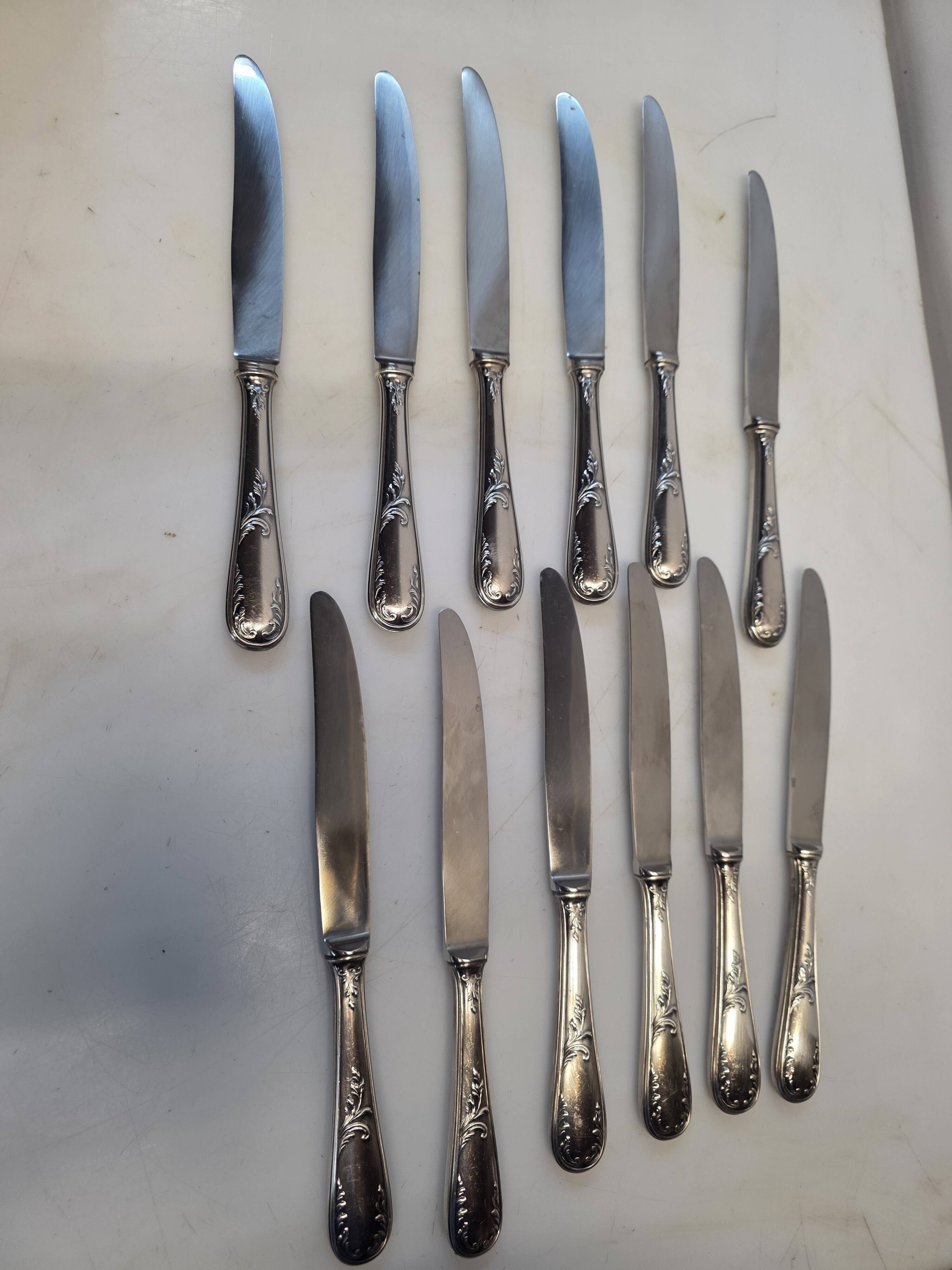 12 silver-plated knives
